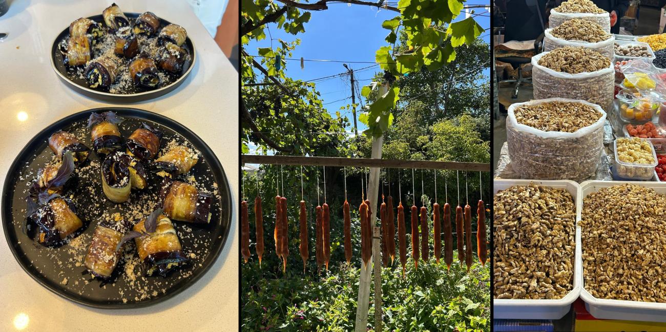 A sweet Georgian treat, churchkhela hangs by string outside in Georgia on a bright day